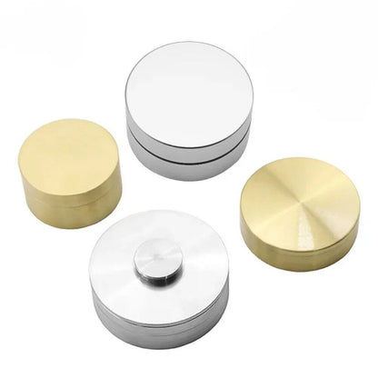 Steel and copper watch oil cylinders for precise cleaning and repair of watch mechanisms.