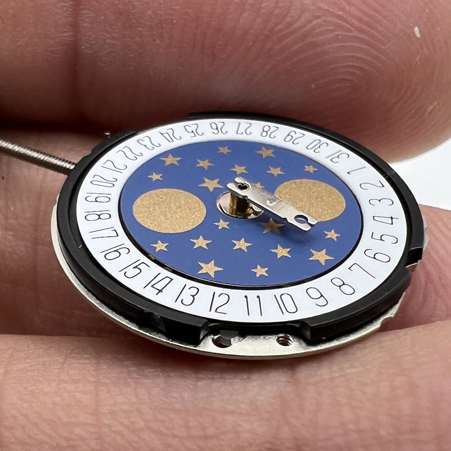 Ronda 788 Quartz watch movement with date at 6, 3 hands, moon phase, Swiss precision for watch repair.
