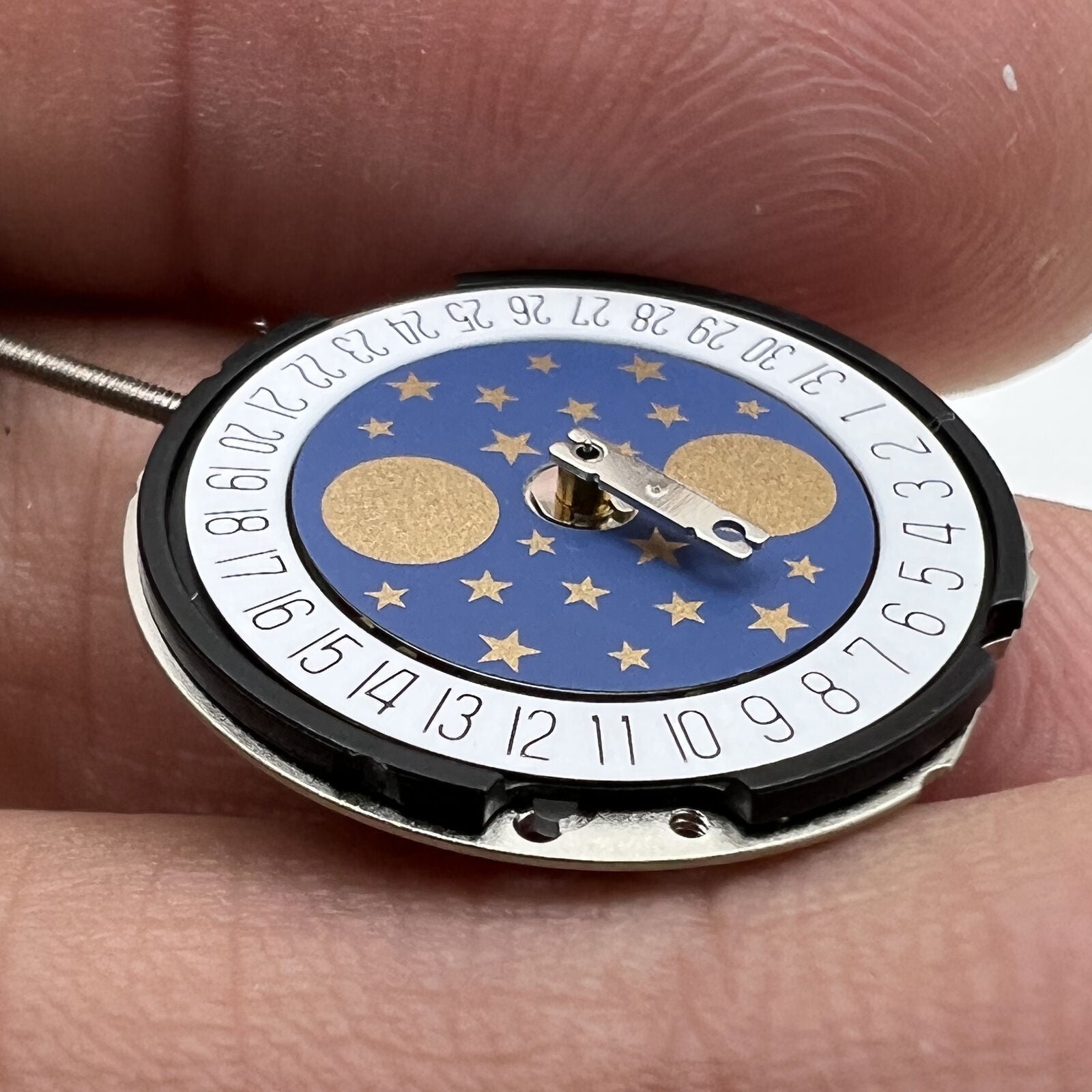 Ronda 788 Quartz watch movement with date at 6, 3 hands, moon phase, Swiss precision for watch repair.