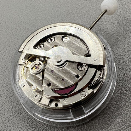 China Made 8205 automatic watch movement featuring small seconds at 3, 6, and 9 o'clock positions for precise timekeeping.
