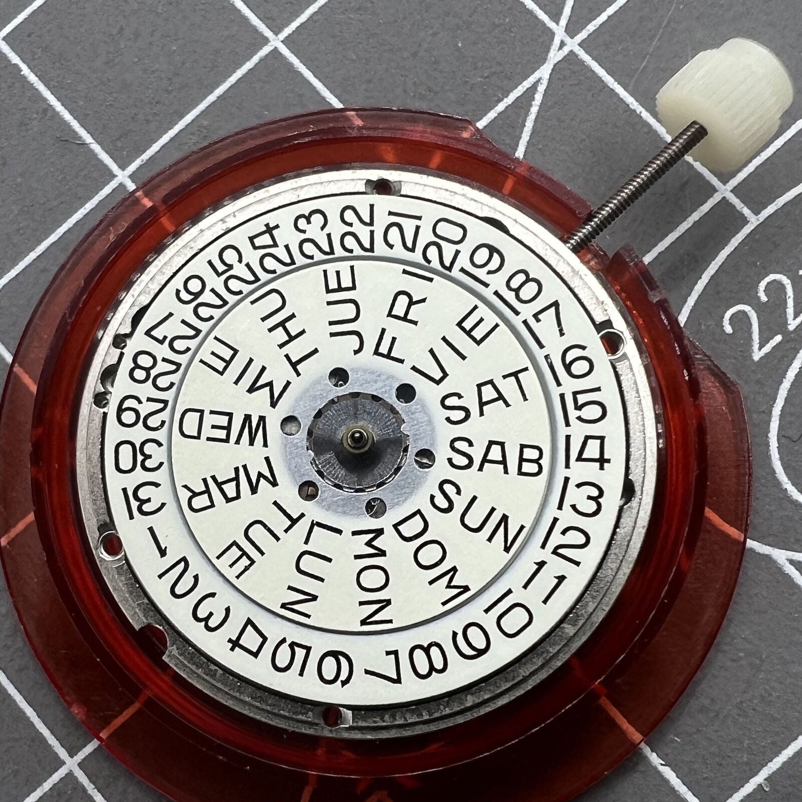 ETA 955.424 quartz watch movement with day, date, and three-hand display for precise timekeeping.