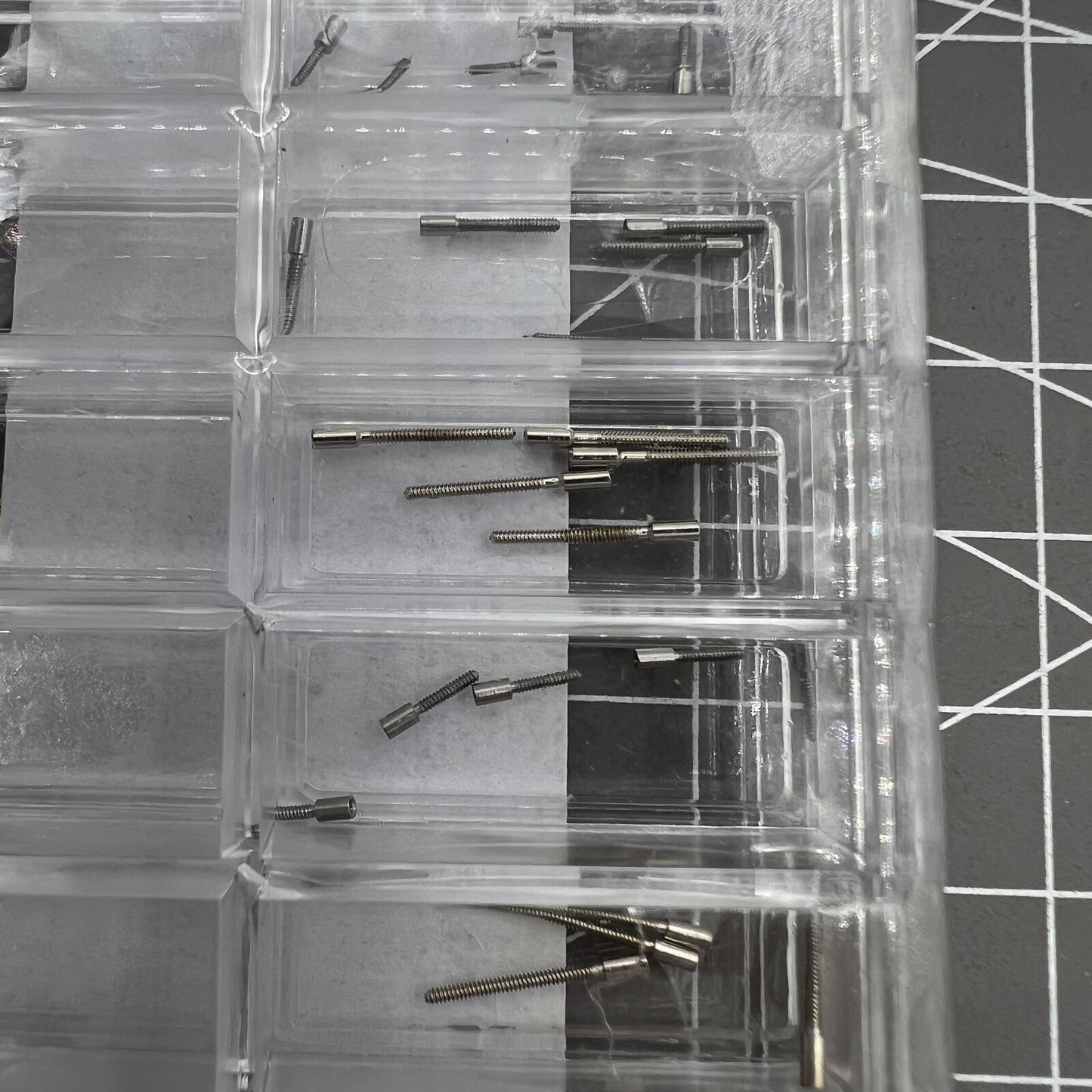 45-piece Swiss ETA watch stem extenders set, 9 sizes for precise watch repair and customization.