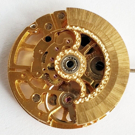 Golden hollow automatic mechanical watch movement, China Made, ideal for practice and repair projects.