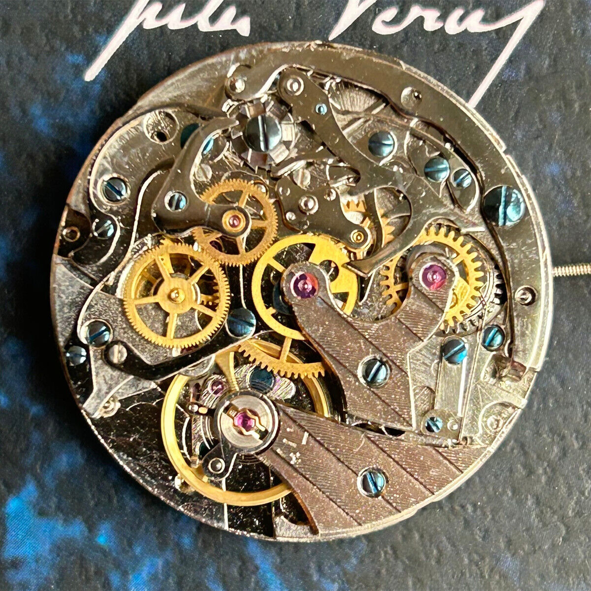 T19 watch with multifunctional kinetic energy indicator at 6 o'clock, precise China-made movement.