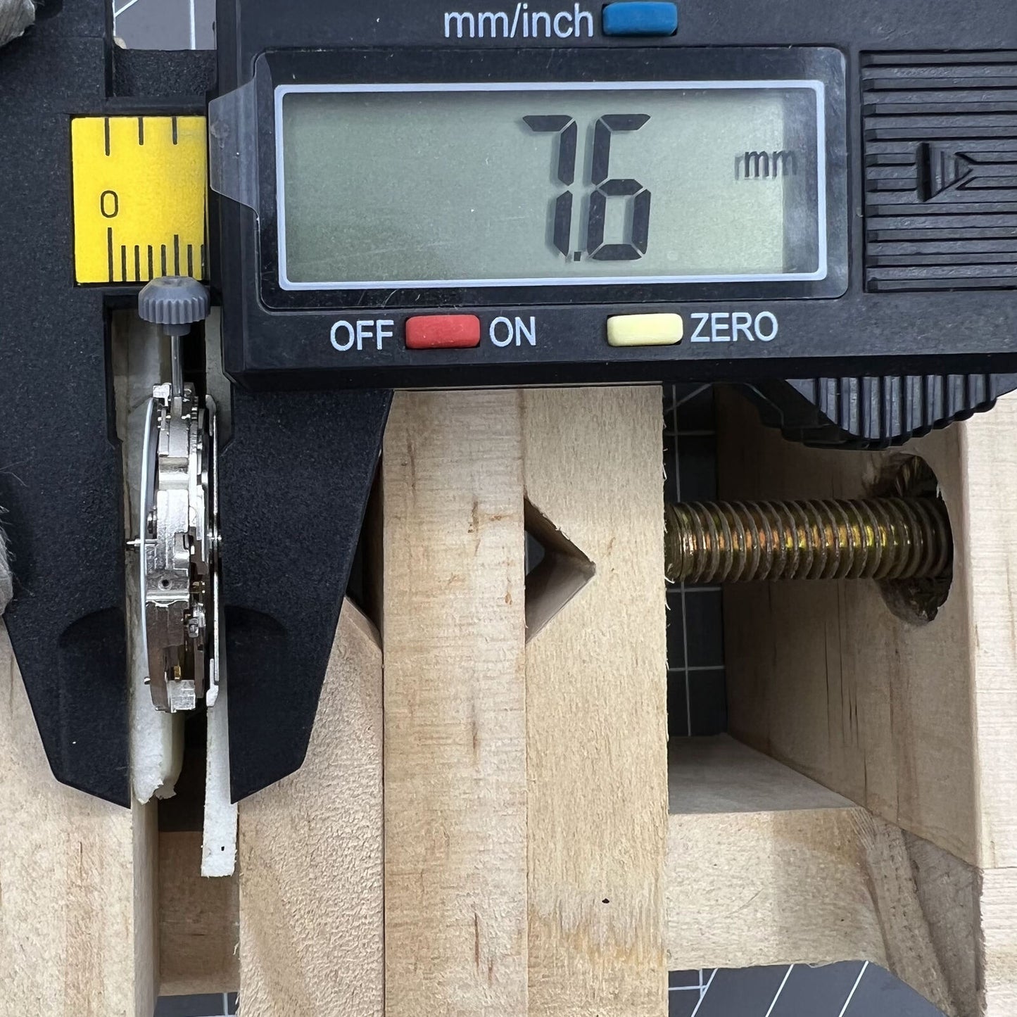 Miyota 8217 automatic watch movement with three hands, small second at 9 o'clock, precise timekeeping by Miyota.