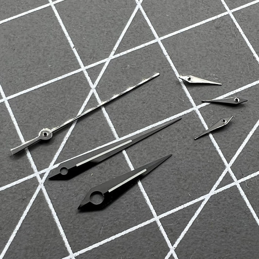 Polished black luminous watch hands set for Ronda 5040B quartz movement, enhancing readability.