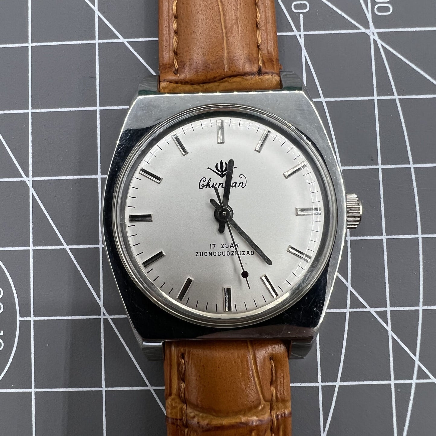 33mm Chunlan steel manual watch with silver dial, 17-jewel movement, sleek band for elegant wear.