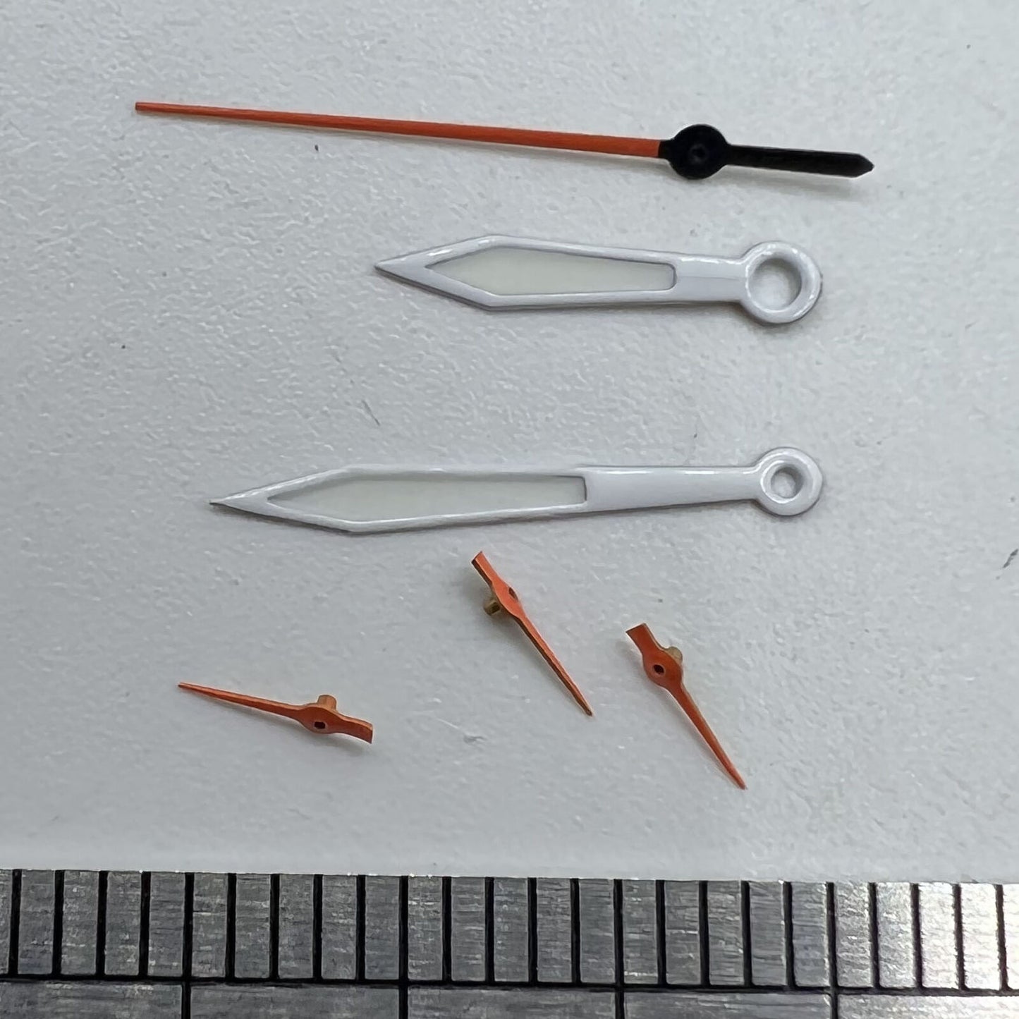 14mm orange and white second watch hand for Miyota OS series, precise timing accessory.