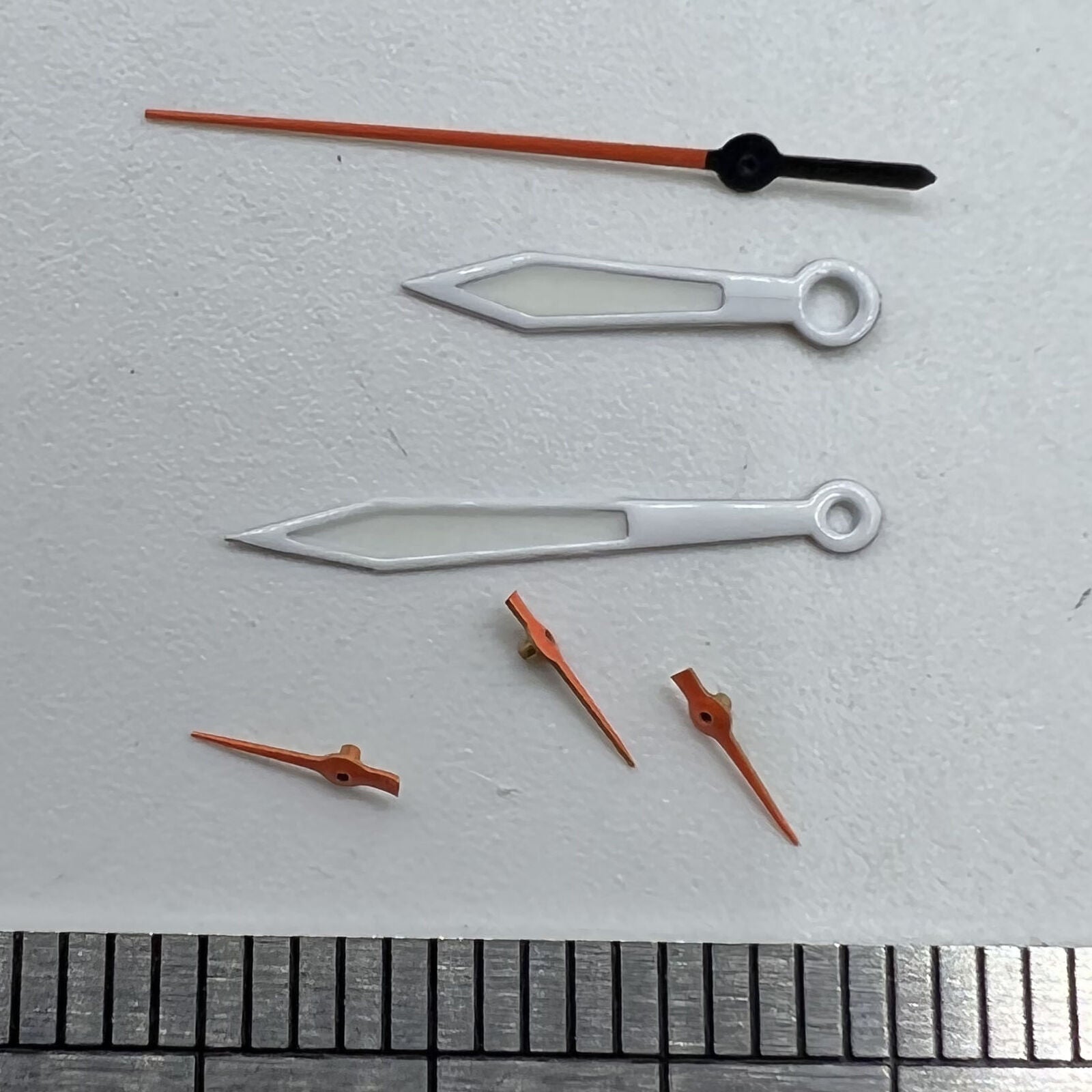 14mm orange and white second watch hand for Miyota OS series, precise timing accessory.