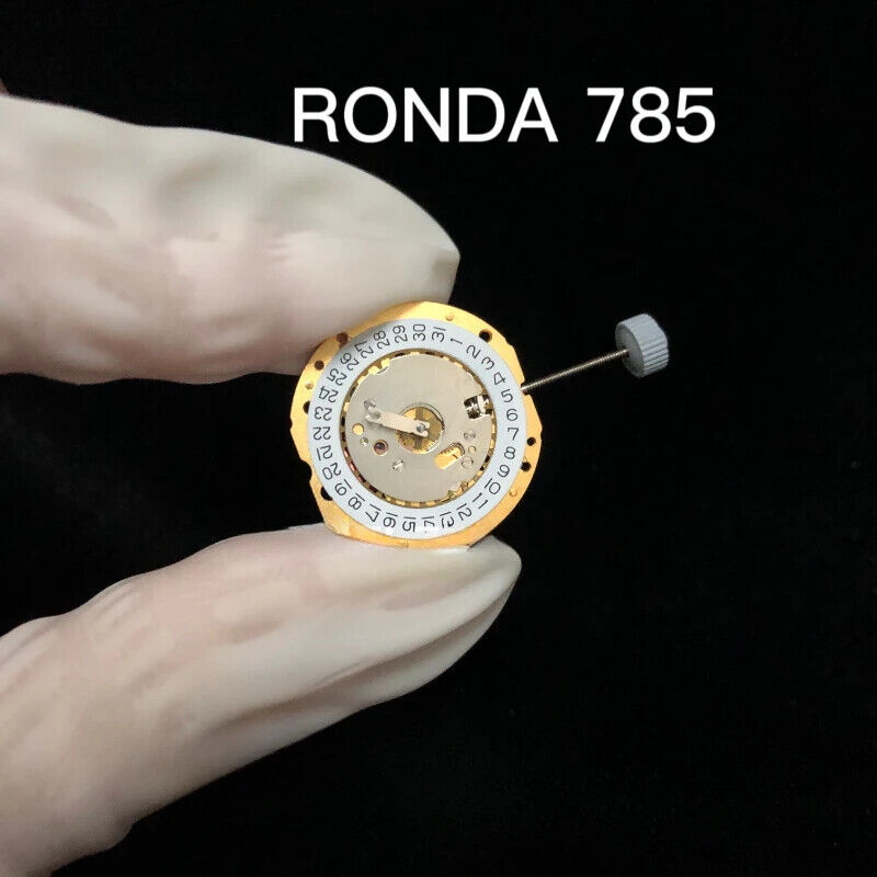 Original Swiss RONDA 785 calendar quartz movement in golden silver finish for precise watch accessories.