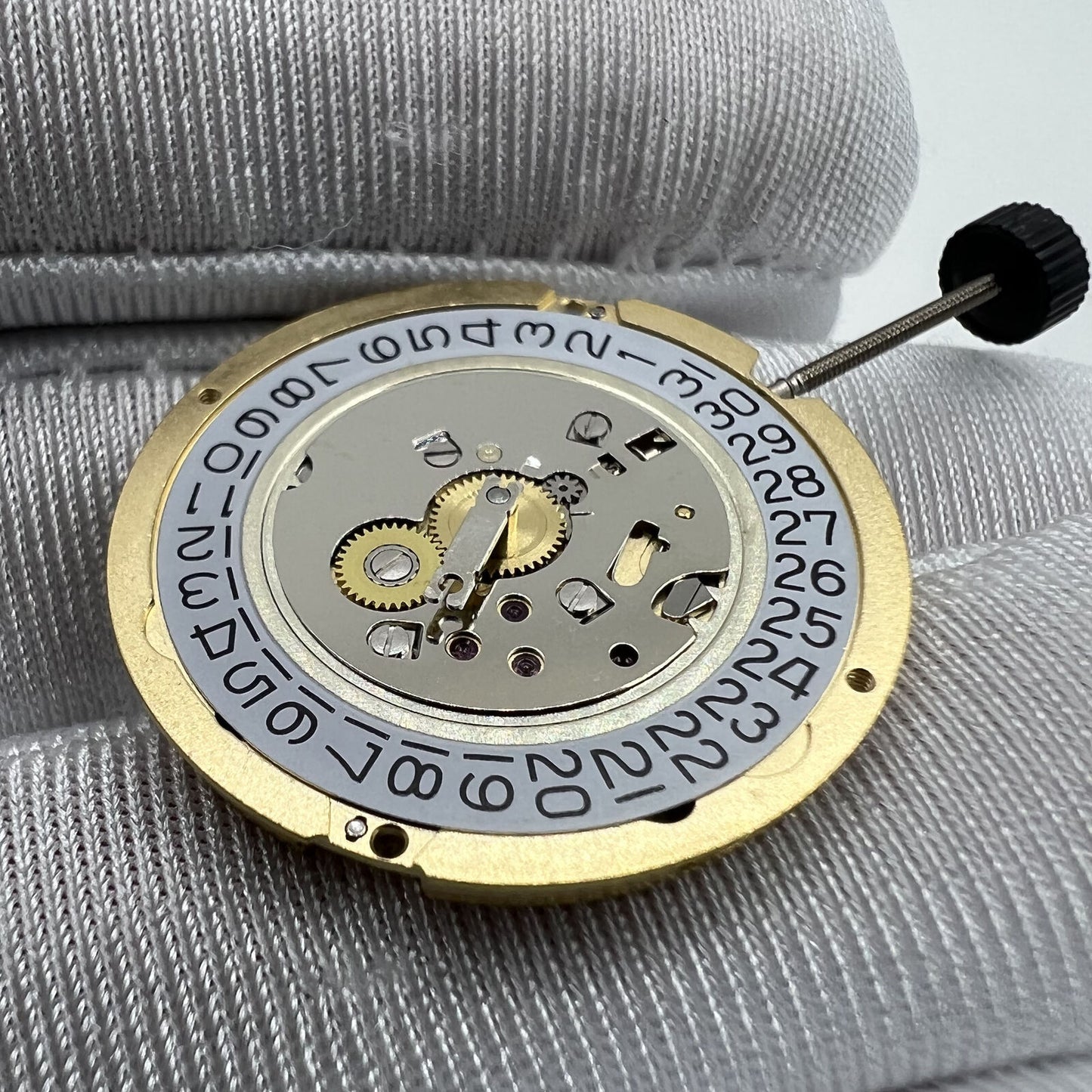 Swiss Movement Ronda 1006 Slimtech quartz watch mechanism for precise timekeeping in accessories.