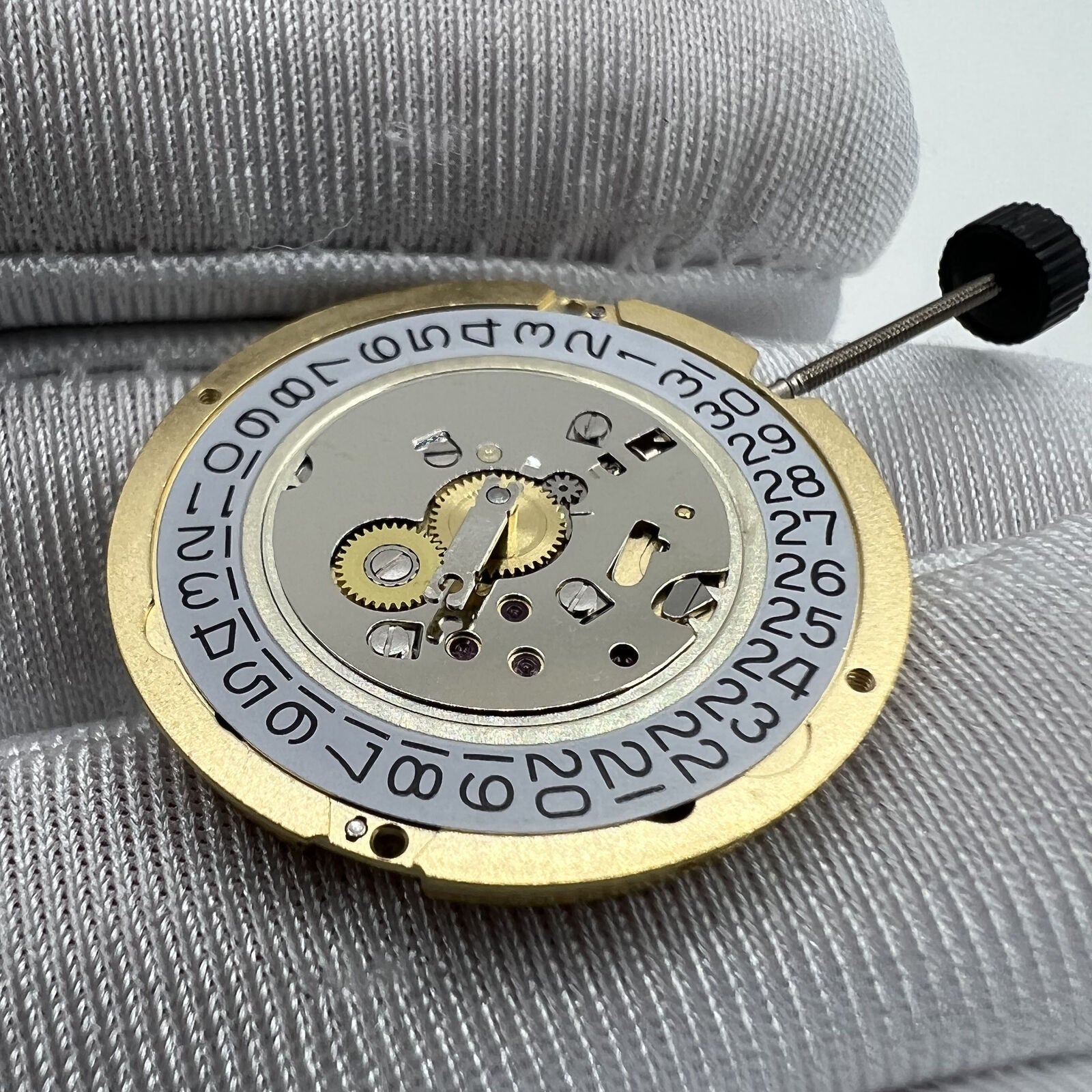 Swiss Movement Ronda 1006 Slimtech quartz watch mechanism for precise timekeeping in accessories.