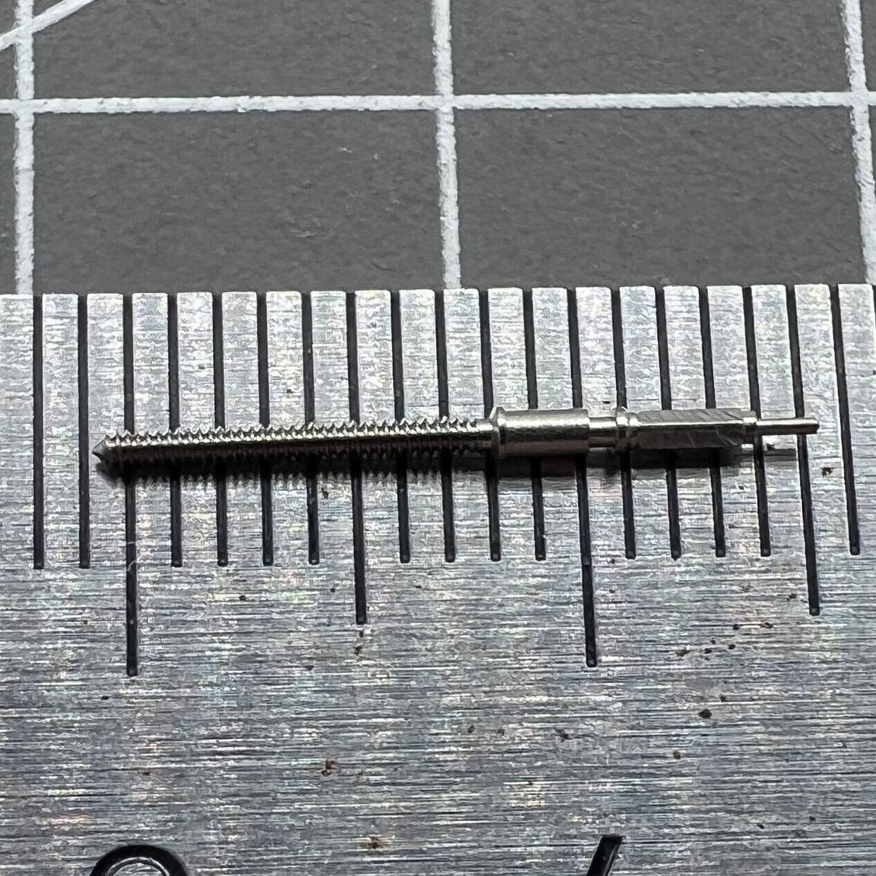Precision watch winding stem for SW200 movement, durable and exact fitting for smooth adjustments.