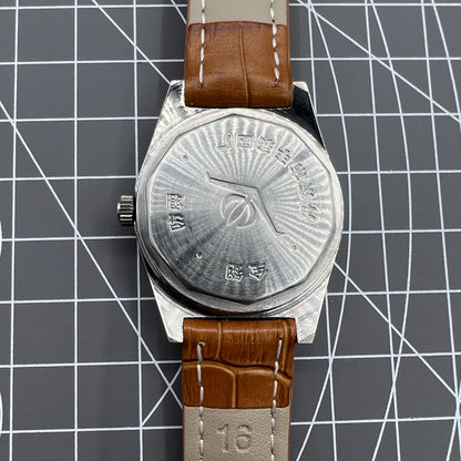 Chunlan 33mm steel manual watch with silver dial, 17-jewel movement, and sleek black band for classic style.