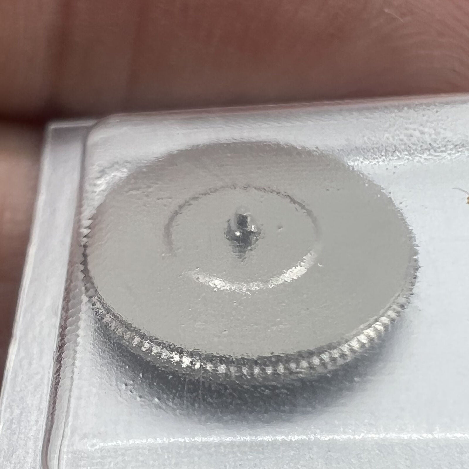 Barrel with complete mainspring for Swiss SW300 watch movement, precise replacement part.