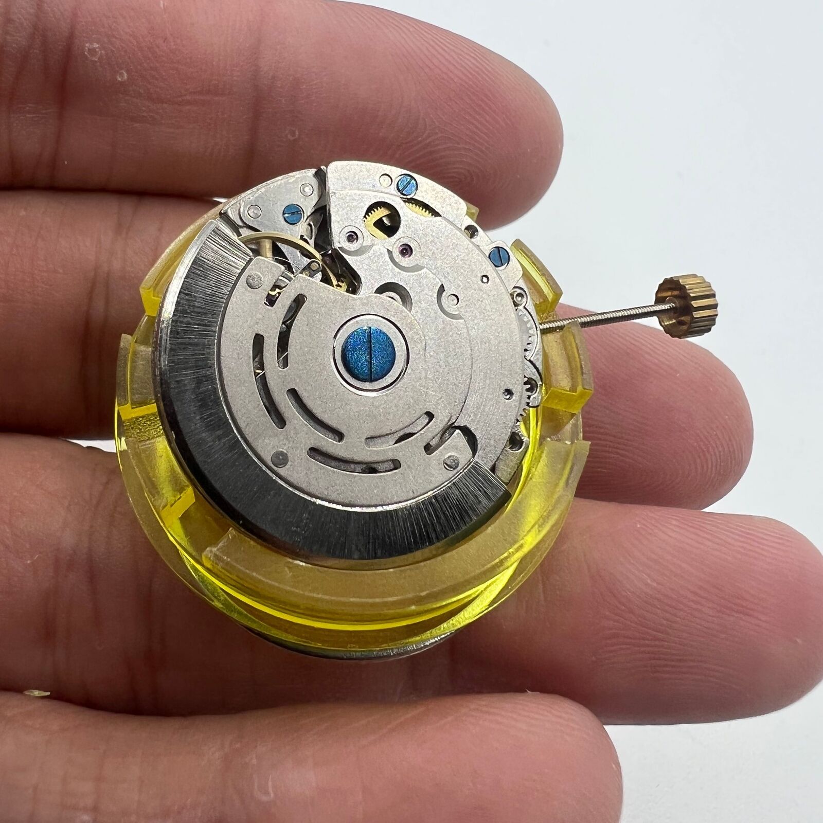 DG2813 automatic mechanical watch movement showing three hands and date window, perfect for replacements.