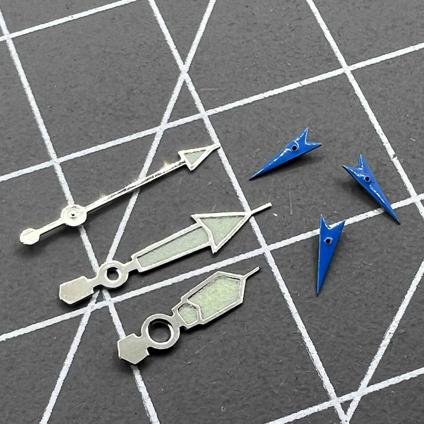 Blue luminous small second hand with silver trim for Miyota OS movements, ideal for watch repairs.