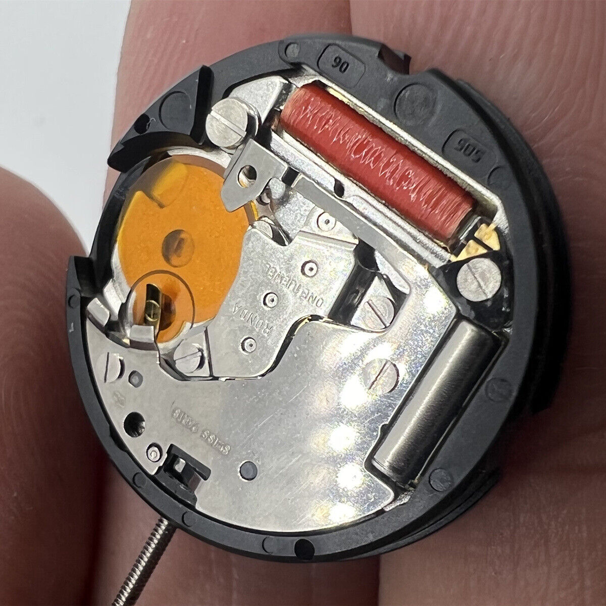 Ronda 585 Swiss quartz movement with date display at 6 o'clock for watch accessories.