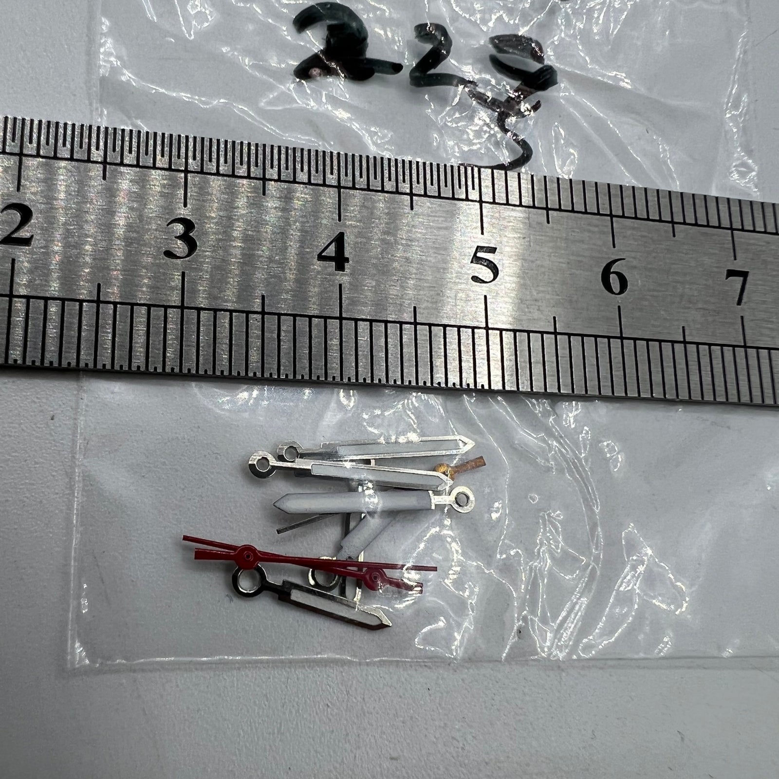 Luminous watch hands by Miyota for 2035 quartz movement, ensuring clear time reading in dim settings.