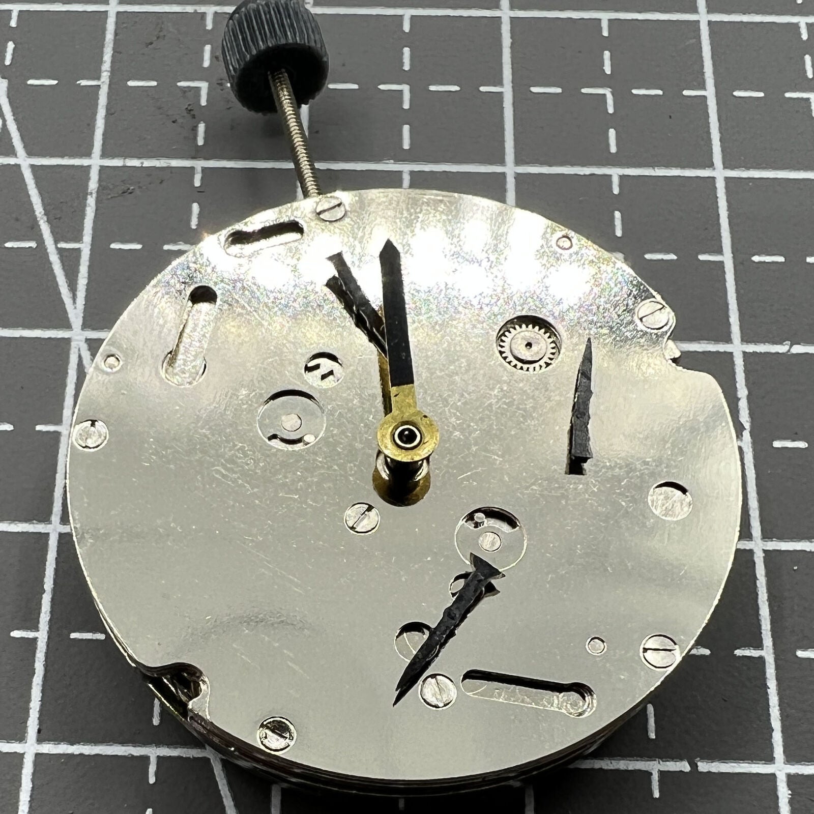 DG2813 automatic watch movement showing three large hands and small seconds at 6 o'clock, no calendar,.