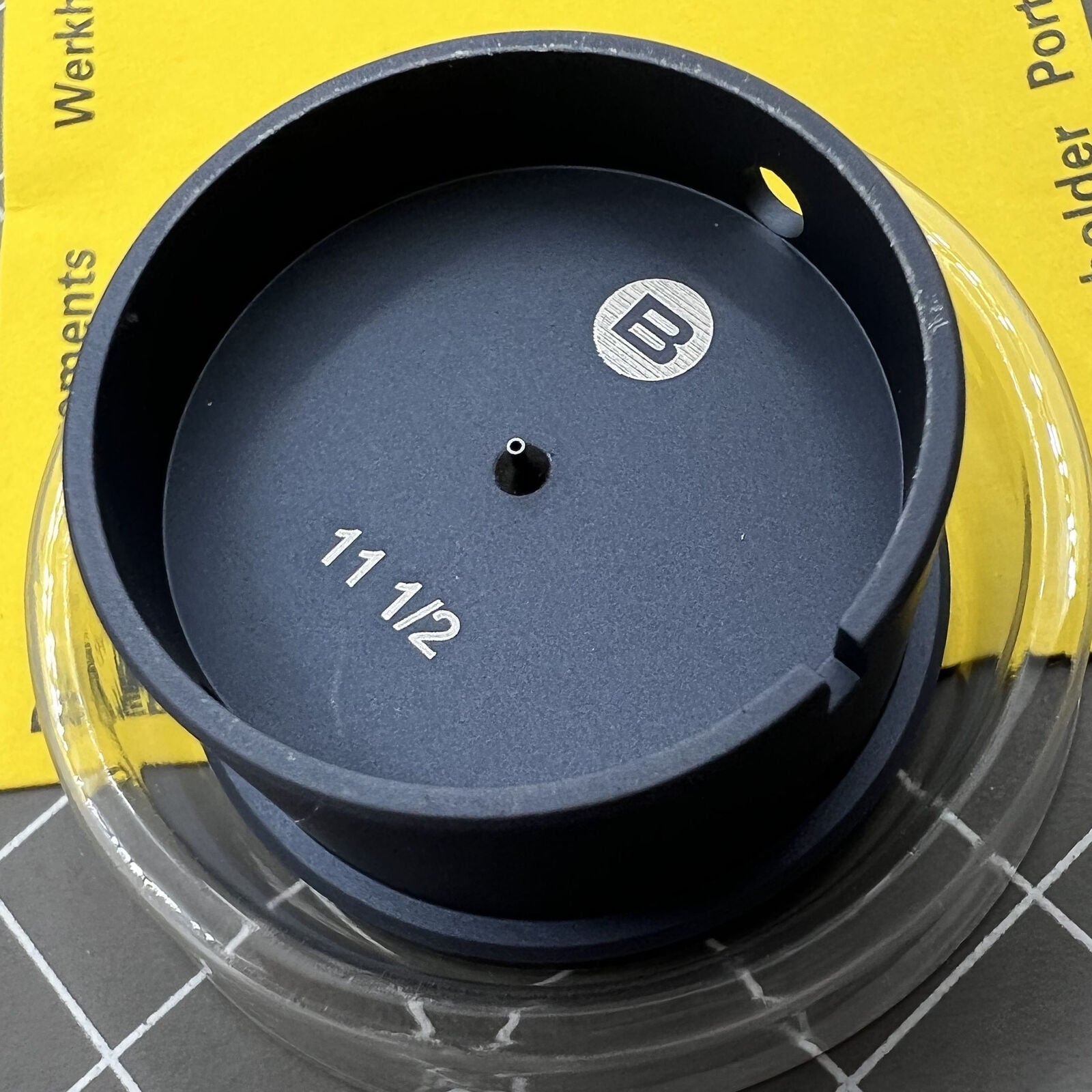 Swiss Bergeon 7100-11 1/2 watch movement holder for precise repair and assembly support.