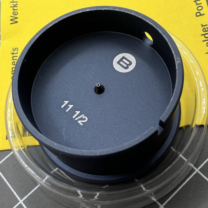Swiss Bergeon 7100-11 1/2 watch movement holder for precise repair and assembly support.