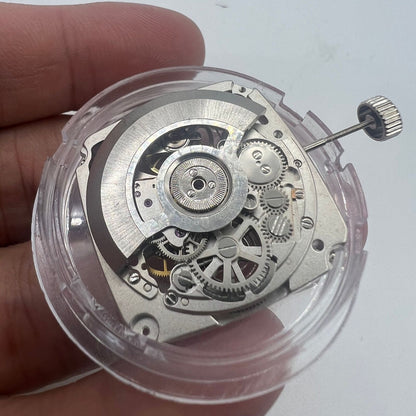 Tianjin Seagull ST25 silver automatic square watch movement with hollow dial and three hands.