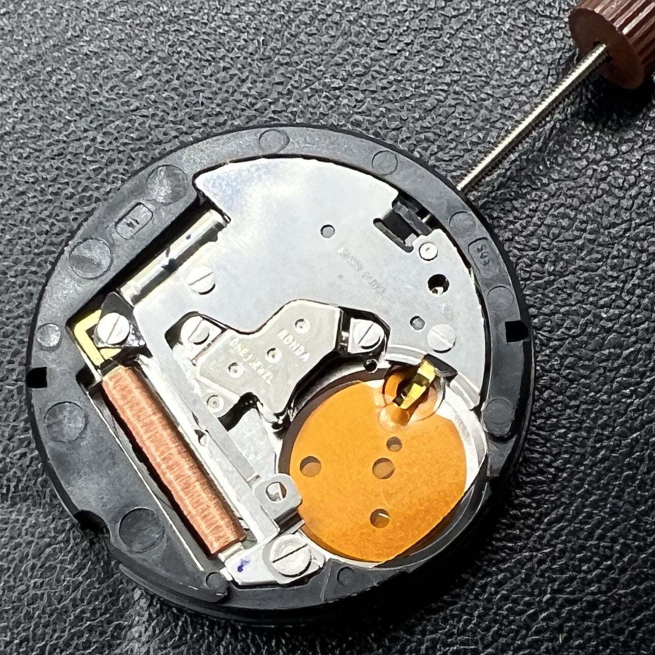 Swiss Ronda 505 quartz watch movement with date display at 3 o'clock for precise timekeeping.