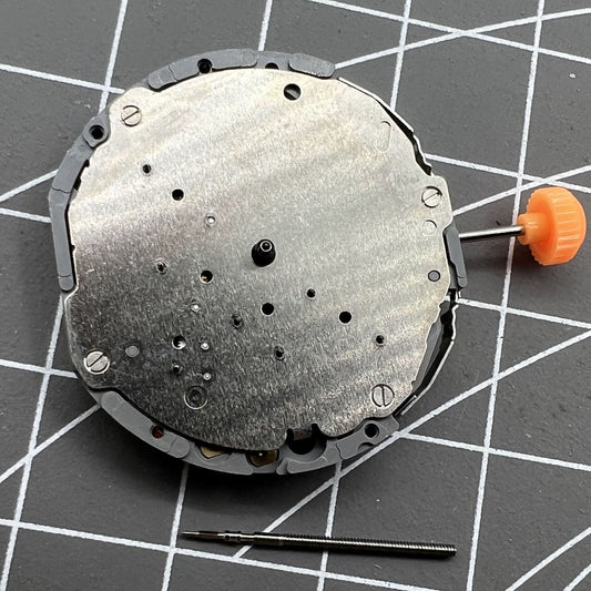 Japan Made Miyota JS55 watch movement with small second hand at 7 o'clock, precise quartz mechanism.
