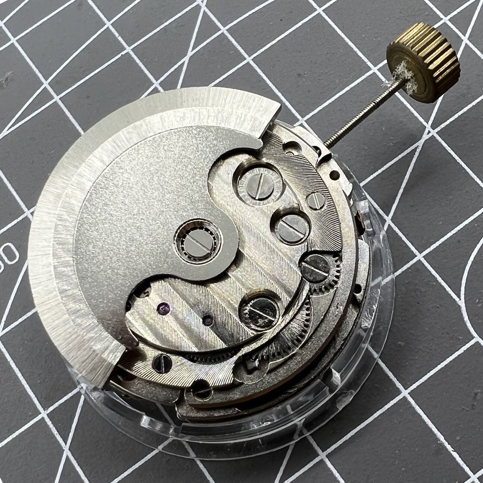 Multifunctional Date watch with bare balance wheel and automatic movement, perfect for stylish timekeeping.