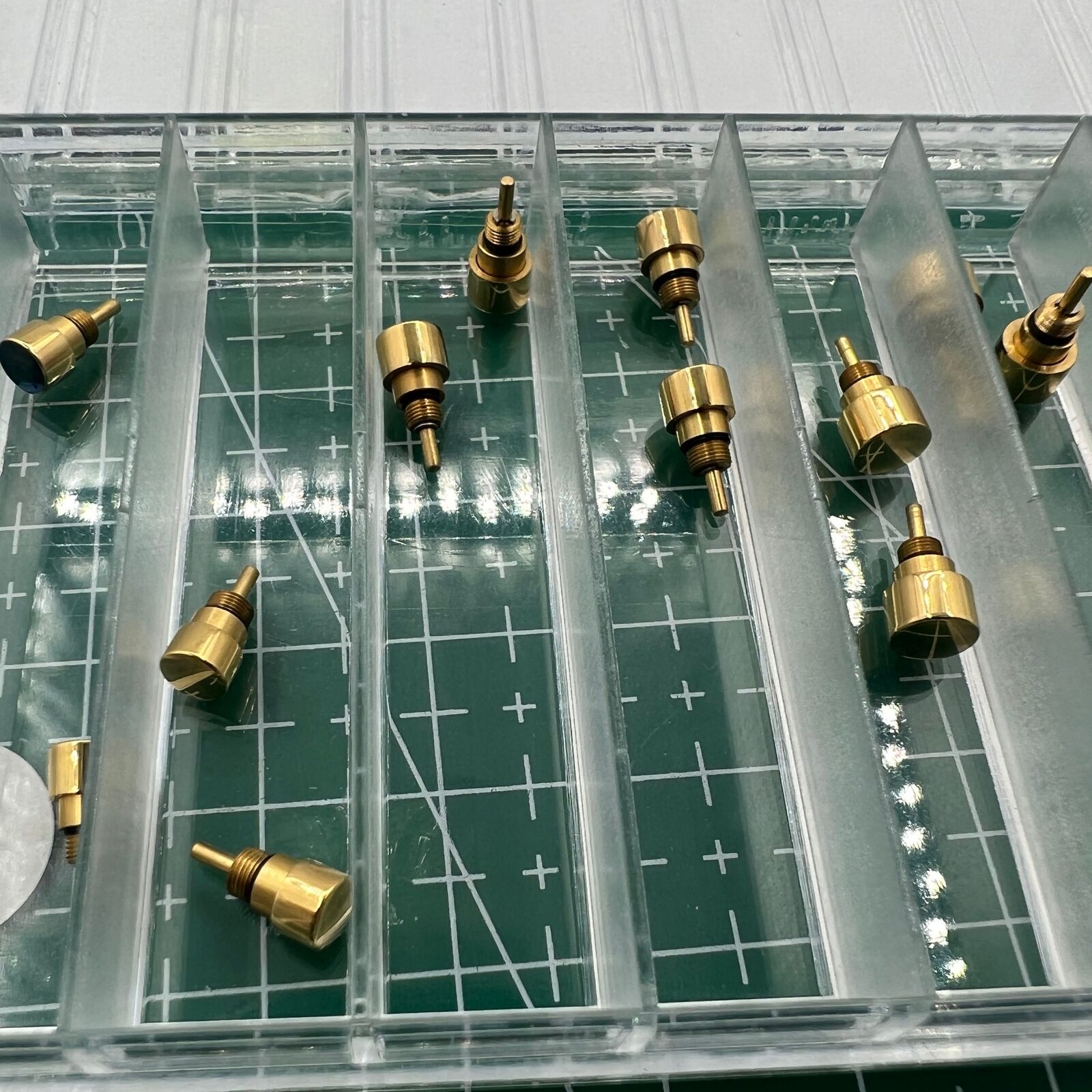 Golden stainless steel watch with classical pusher, durable design for elegant timekeeping.