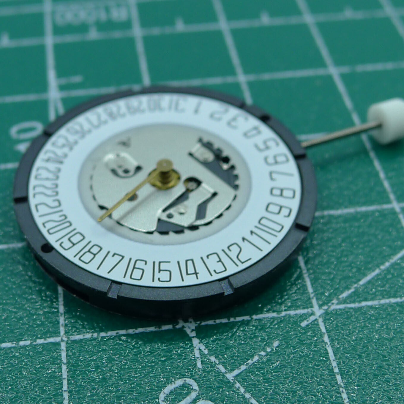 Swiss ISA 2331 black dial quartz watch part with date at 6, perfect for watch repairs and customization.