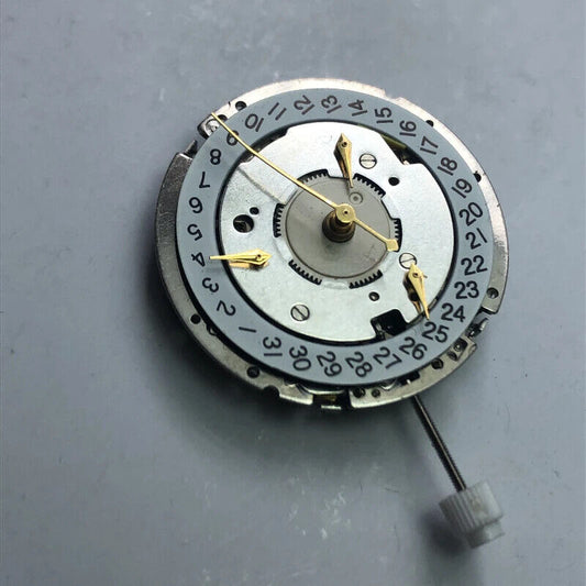 Swiss Made ISA 8154 quartz watch movement with date at 4 and alarm clock function.
