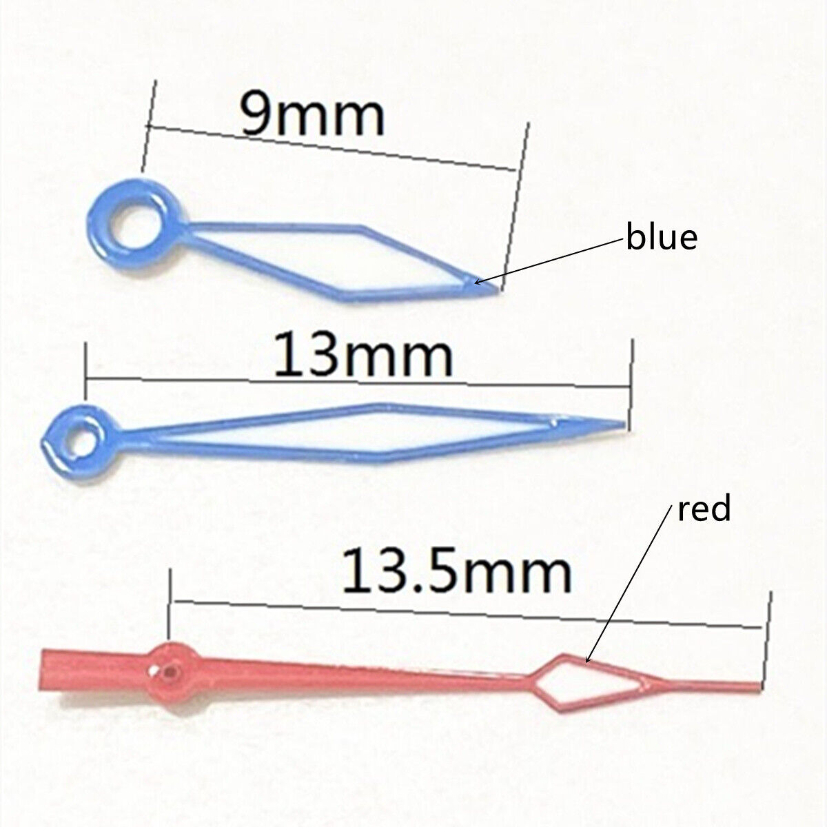 Diamond-shaped luminous watch hands with blue and red trim for Ronda 515 quartz movement, perfect for watch repairs.