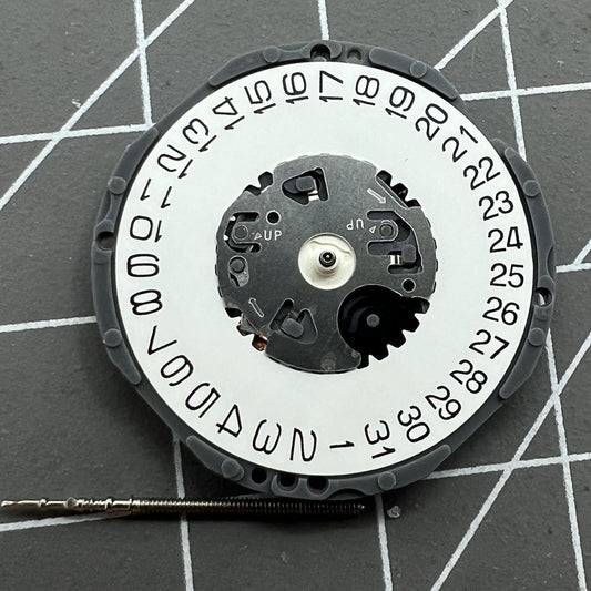 Japan Made Epson VJ32B quartz watch movement with single calendar at 3 o'clock, precise timekeeping part.