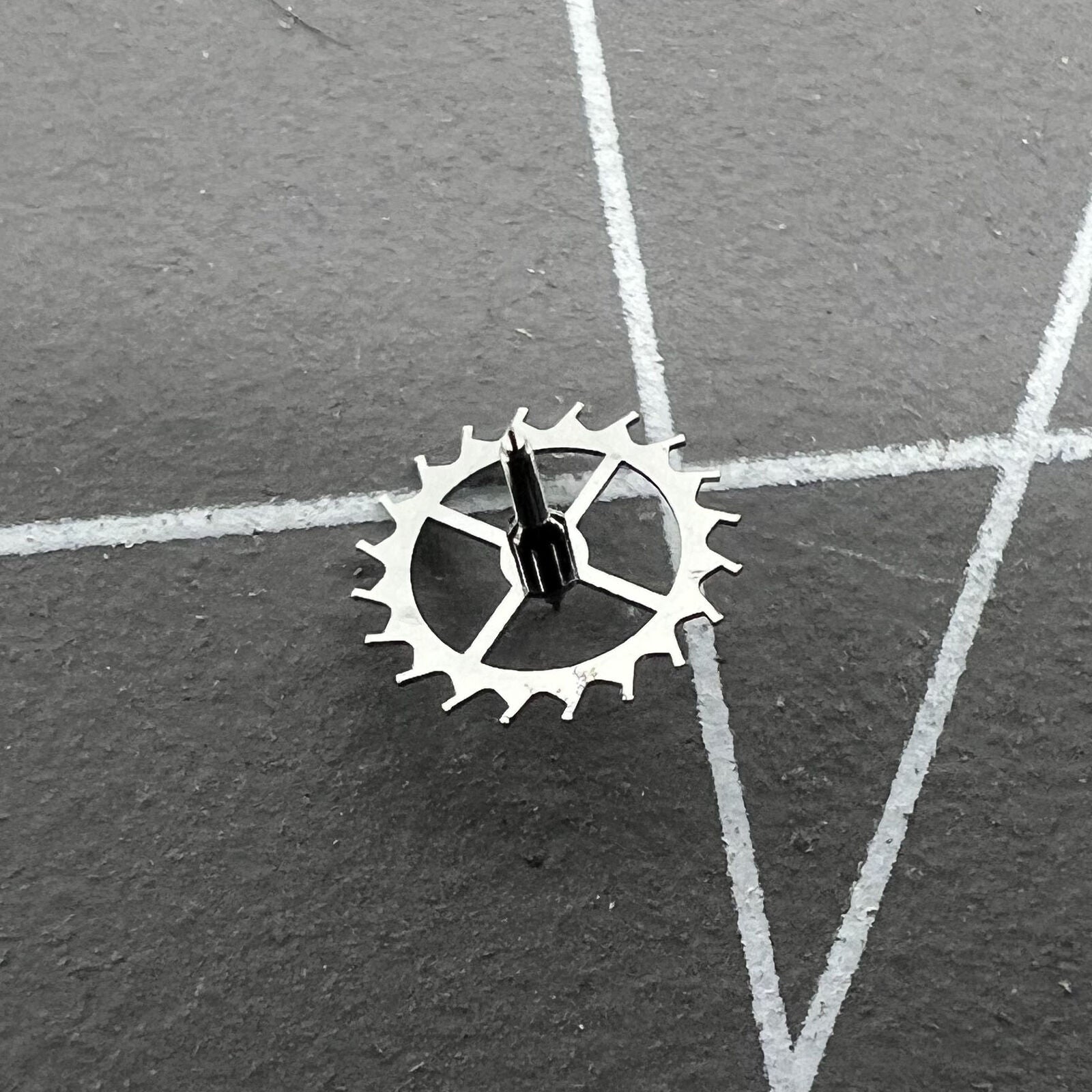Escape wheel gear for Dandong 7750 watch movement, precise replacement part for timepiece repair.