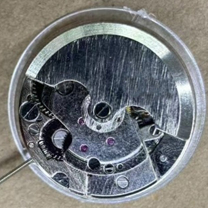 China Made New 7120 automatic watch showcasing mechanical movement, 24-hour display, and moon phase