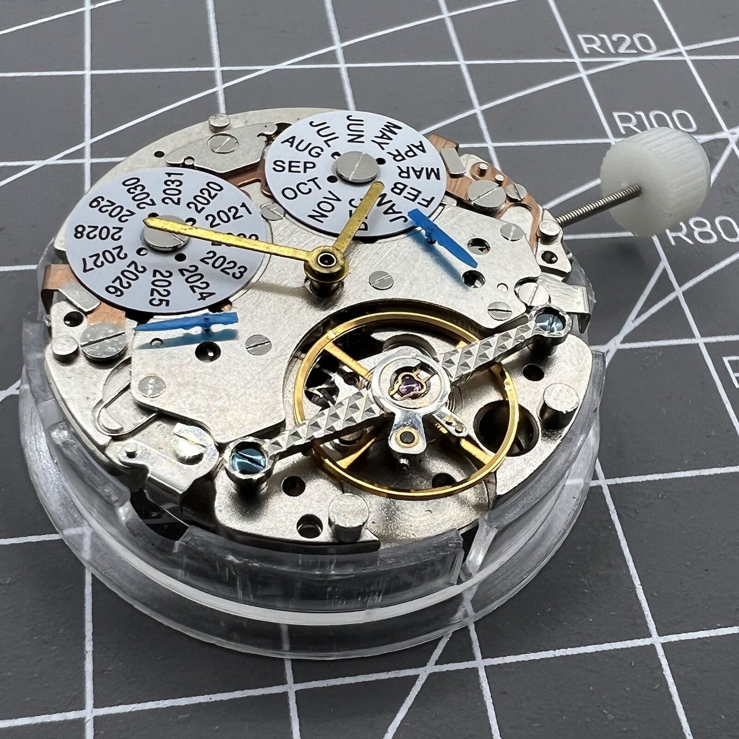 Multifunctional perpetual calendar watch accessory with LB automatic mechanical movement detail.