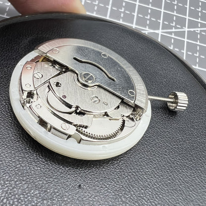 Tianjin Seagull T16 watch with golden dial, day-date function, automatic mechanical movement, elegant design.