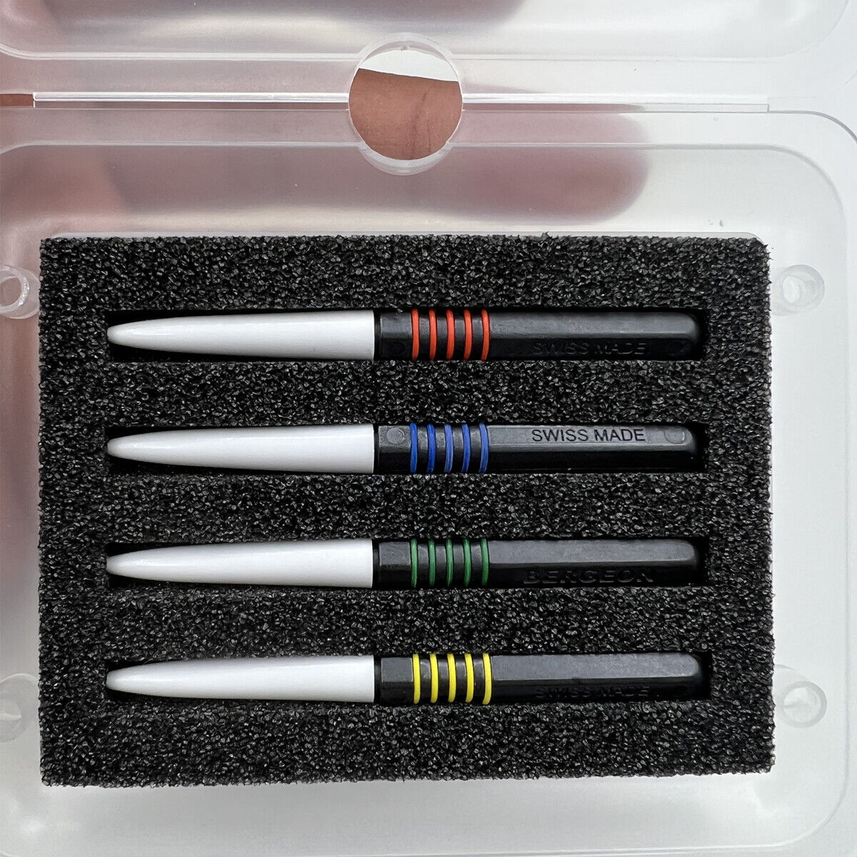 Bergeon 7013-4 metal dip oilers set with ergonomic grips for precise watch oiling and maintenance.