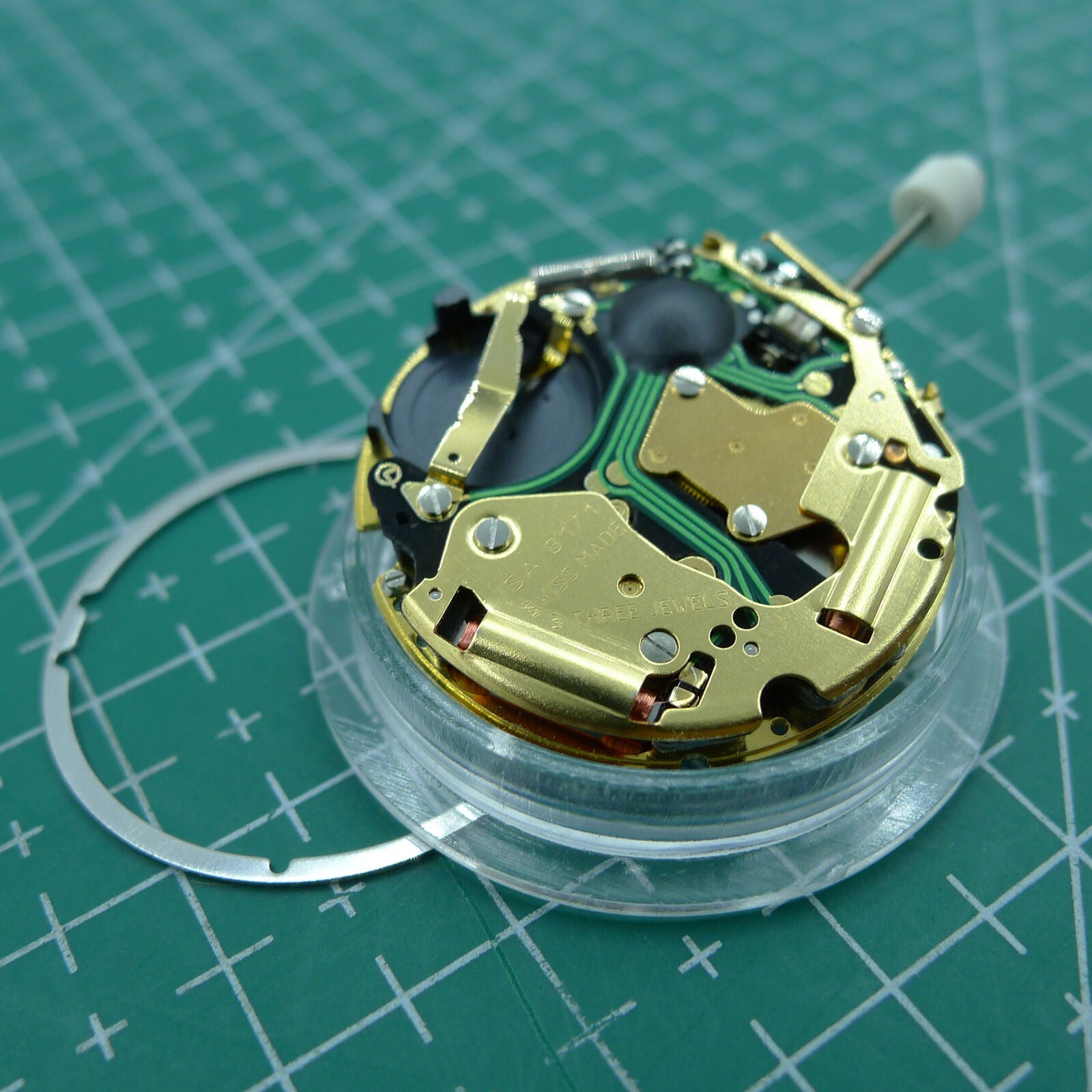 Swiss Made ISA 8171 quartz watch movement with date display and multifunctional features for precise timekeeping.