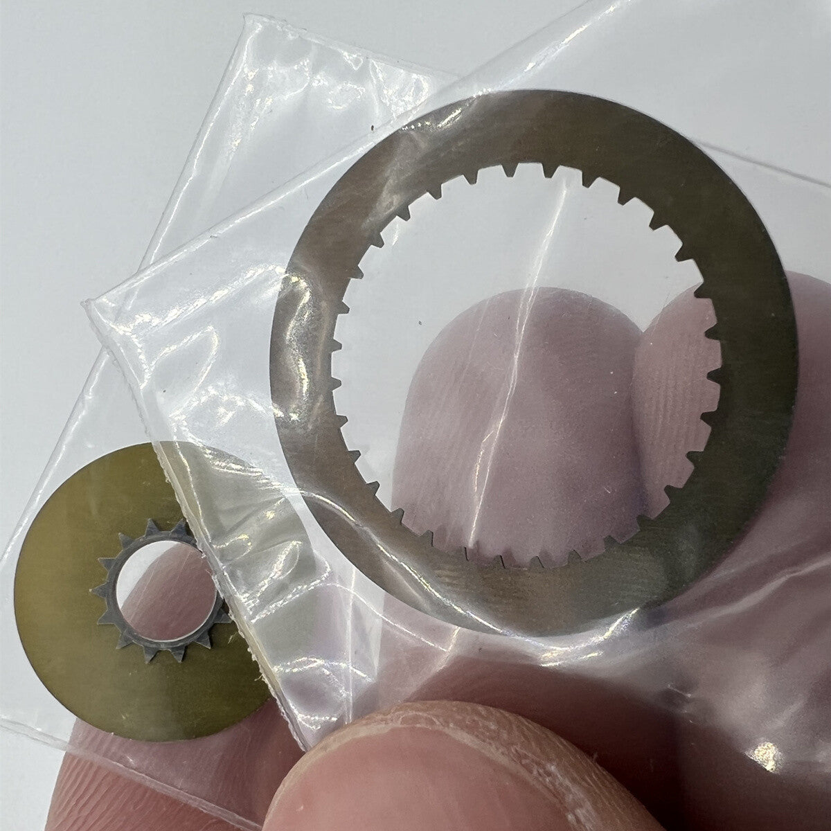 White date disk wheel for ETA7750 movement, genuine replacement part enhancing watch accuracy.