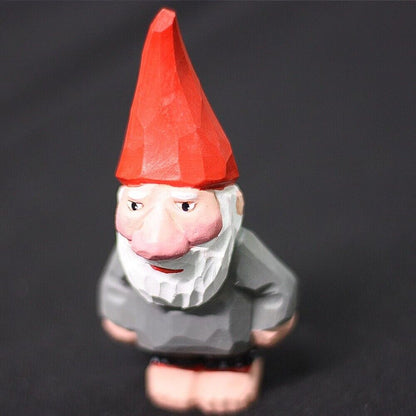 Handmade wooden dwarf garden elf figurine, charming decorative sculpture for outdoor display.