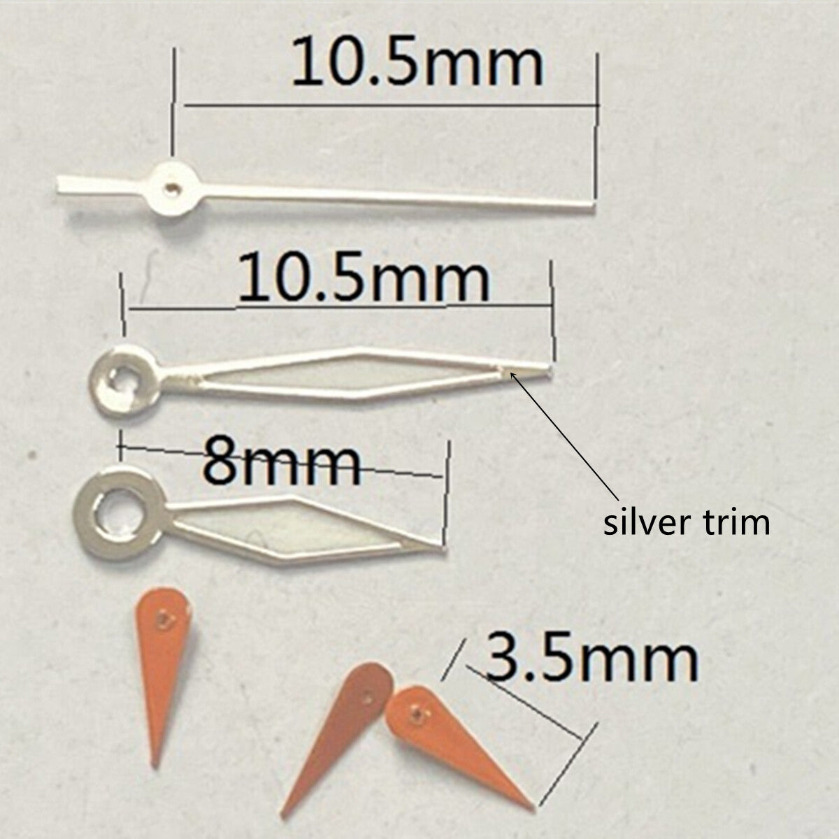 Orange and silver diamond-shaped watch hands with green lume, compatible with VD53, VD54, VD57 movements.