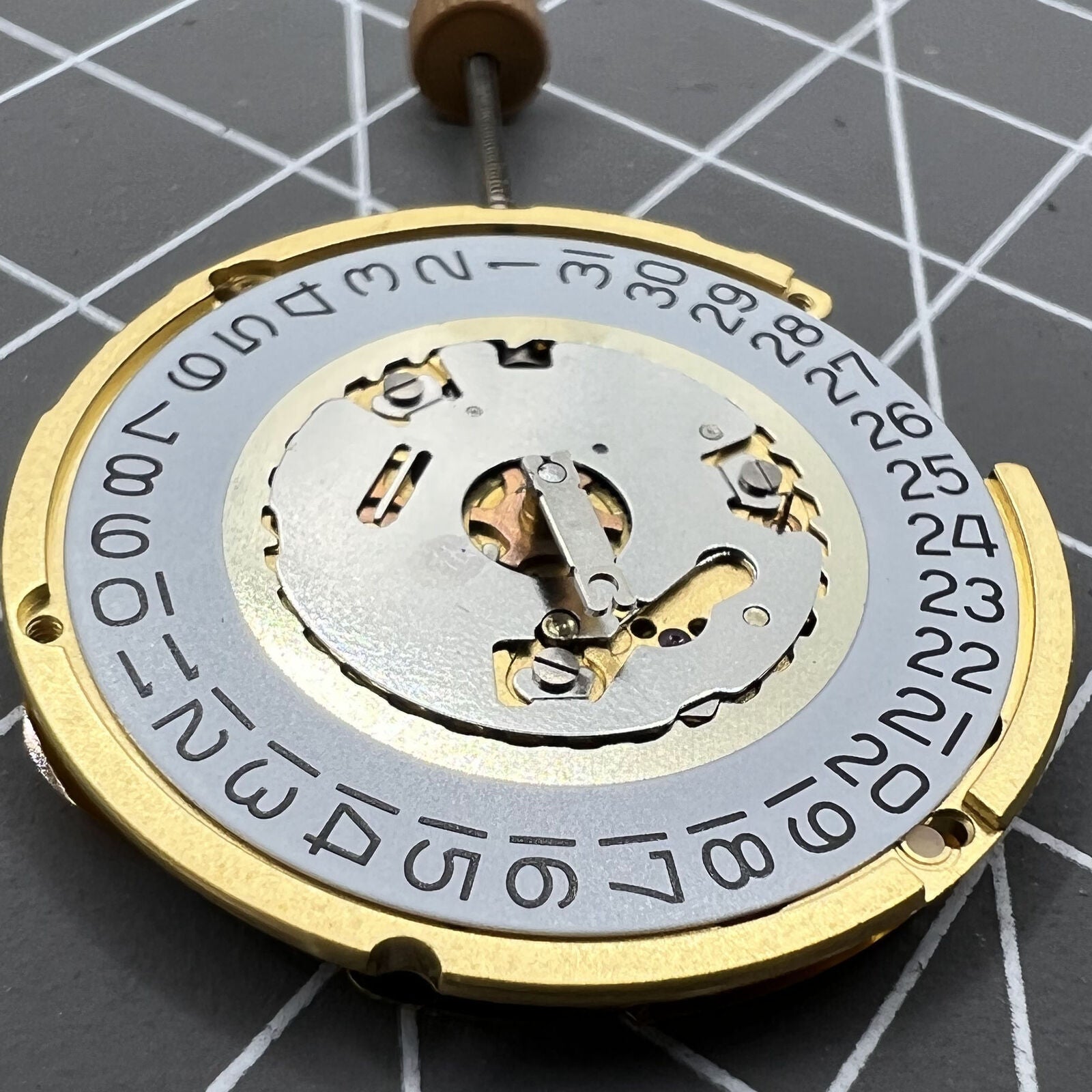 Swiss Made Ronda 6004D quartz watch movement with date display at 3 o?clock, precision timing by Ronda.