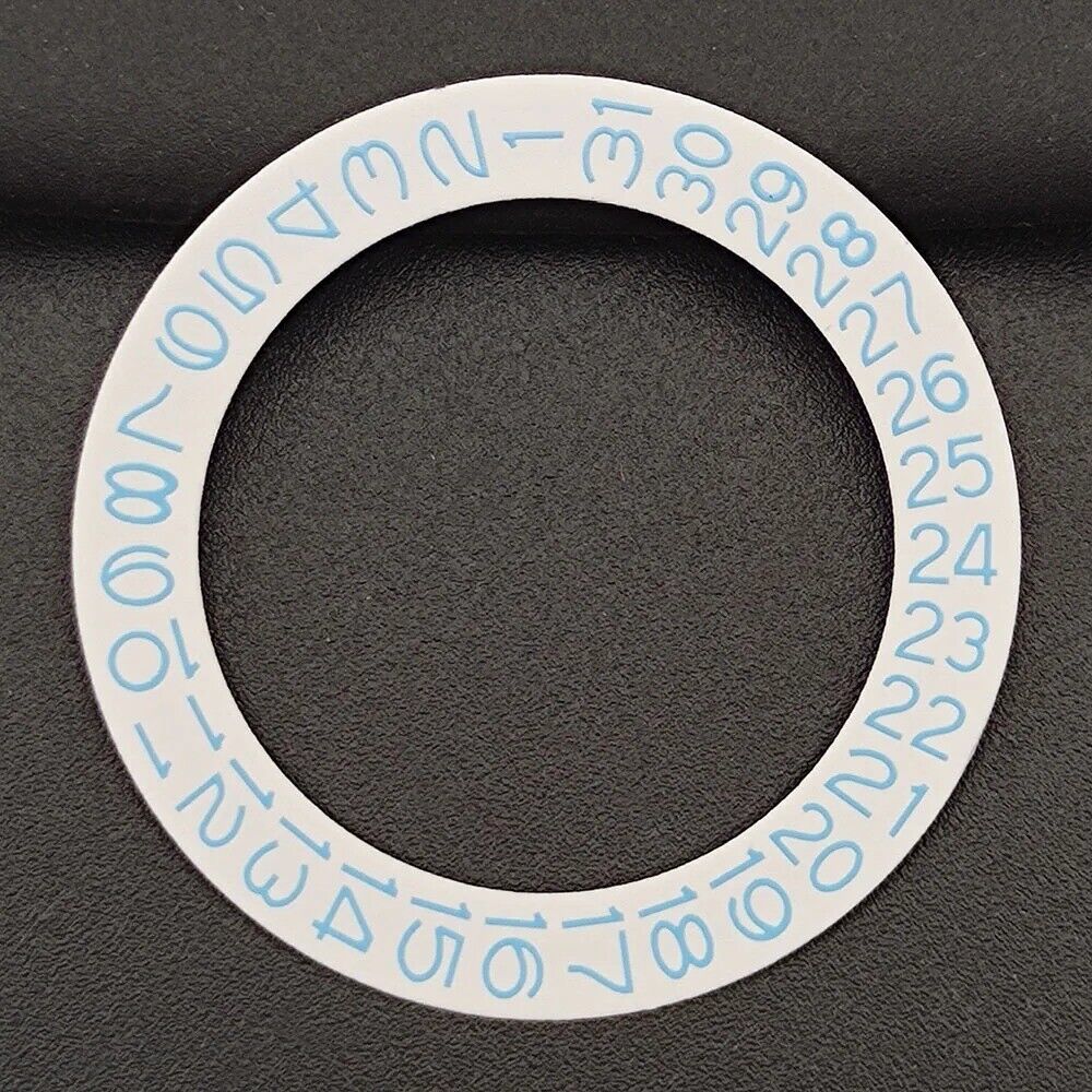 Blue date wheel overlay for NH35 NH36 watch movement, branded precision part enhancing dial clarity and style.