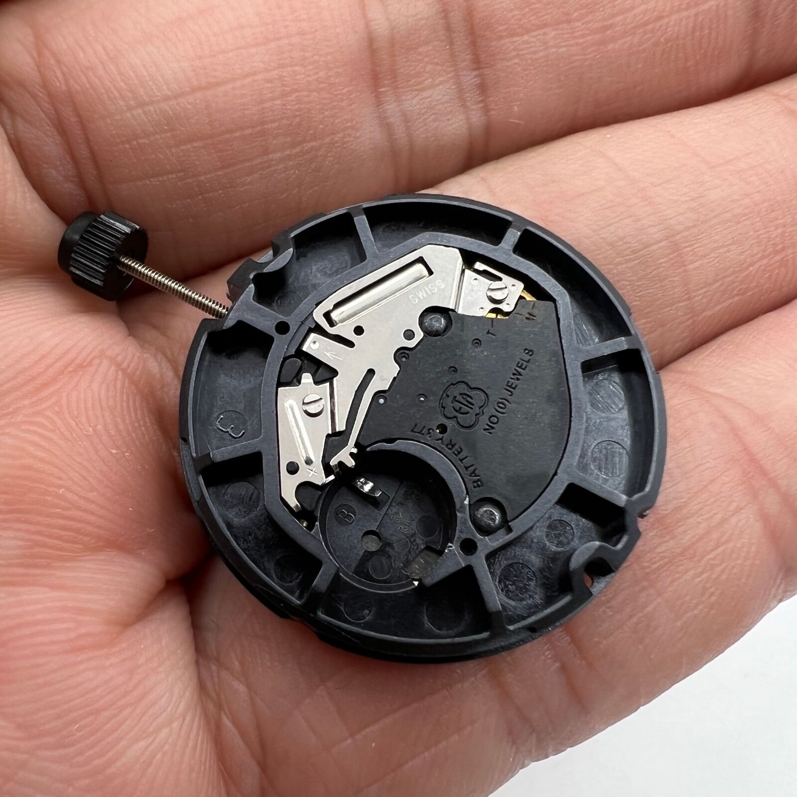 Swiss Made ETA 805.112 quartz watch movement with 3 hands, date display at 3 o'clock, ideal for watch repairs.