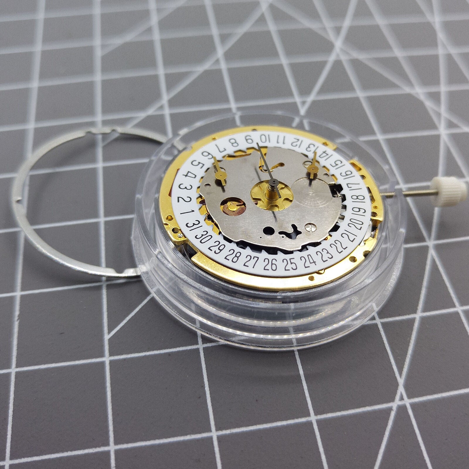 Swiss Made ISA 8171 quartz watch movement with date at 6, multifunctional for precision timekeeping.