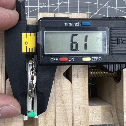 ETA 2824-2 Swiss mechanical watch movement showcasing intricate gear and component details for precise timekeeping.