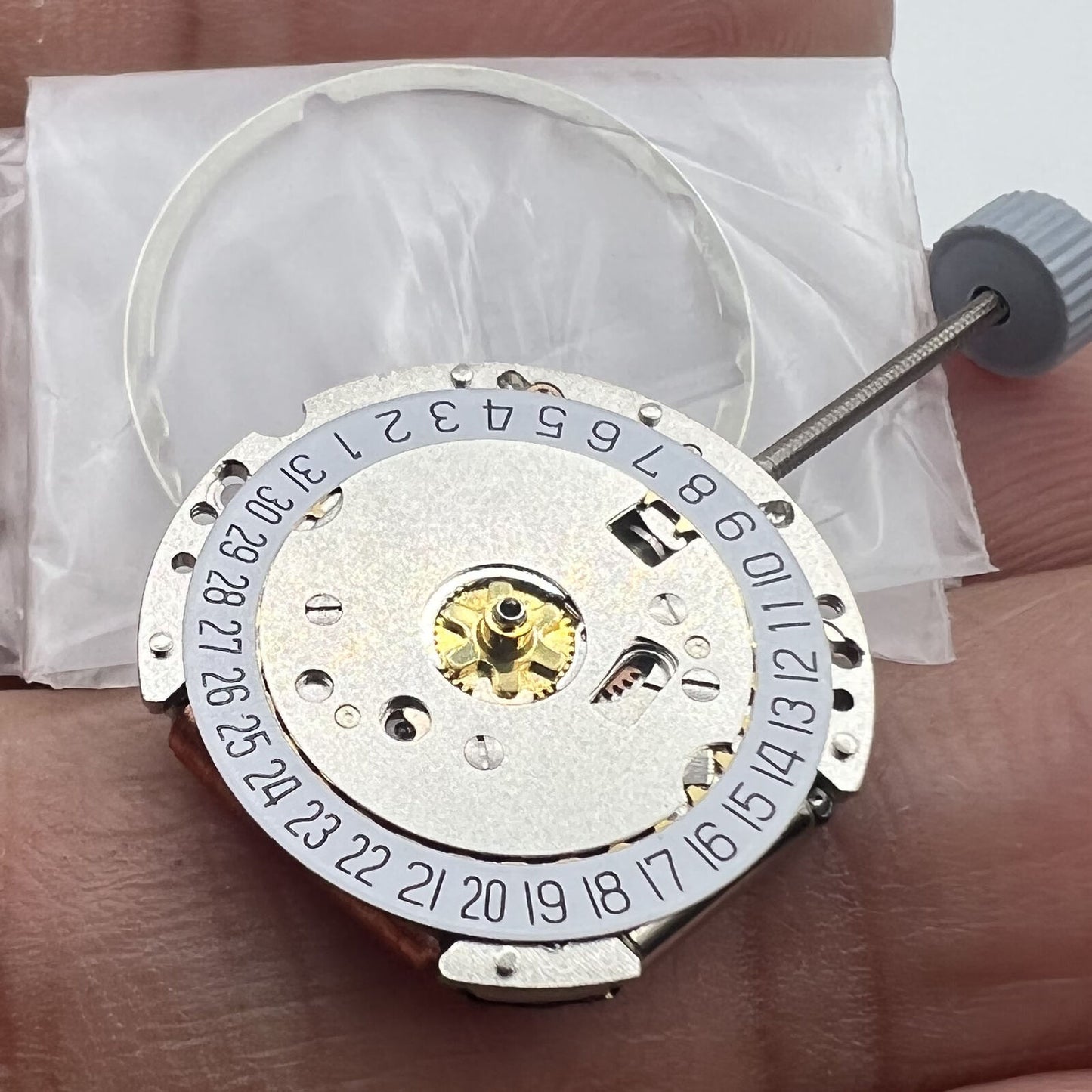 Ronda 775 quartz watch movement with date display at 6 o'clock, precision timekeeping accessory